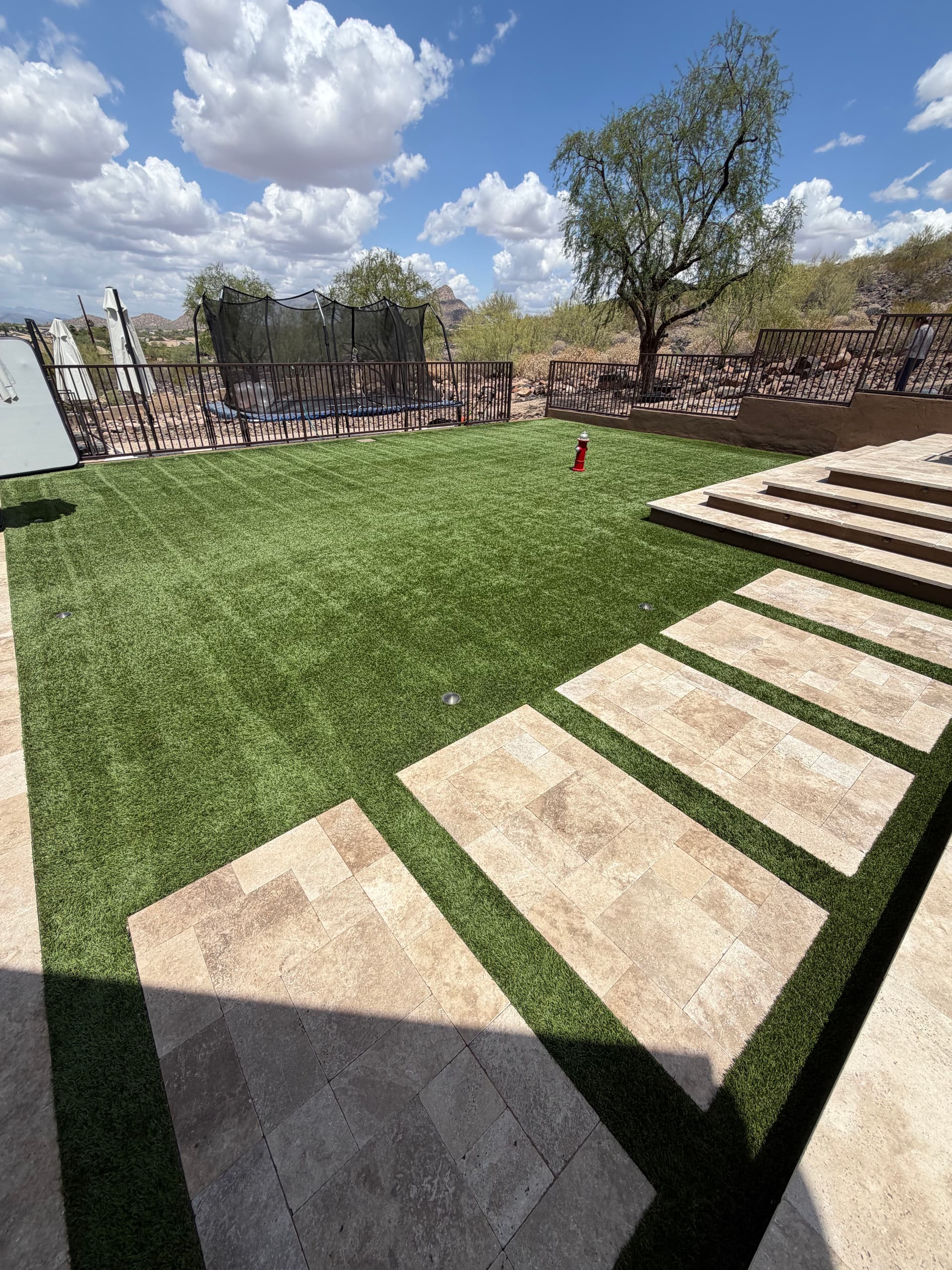 Quarterly Turf Maintenance Keeps This Backyard Looking Sharp